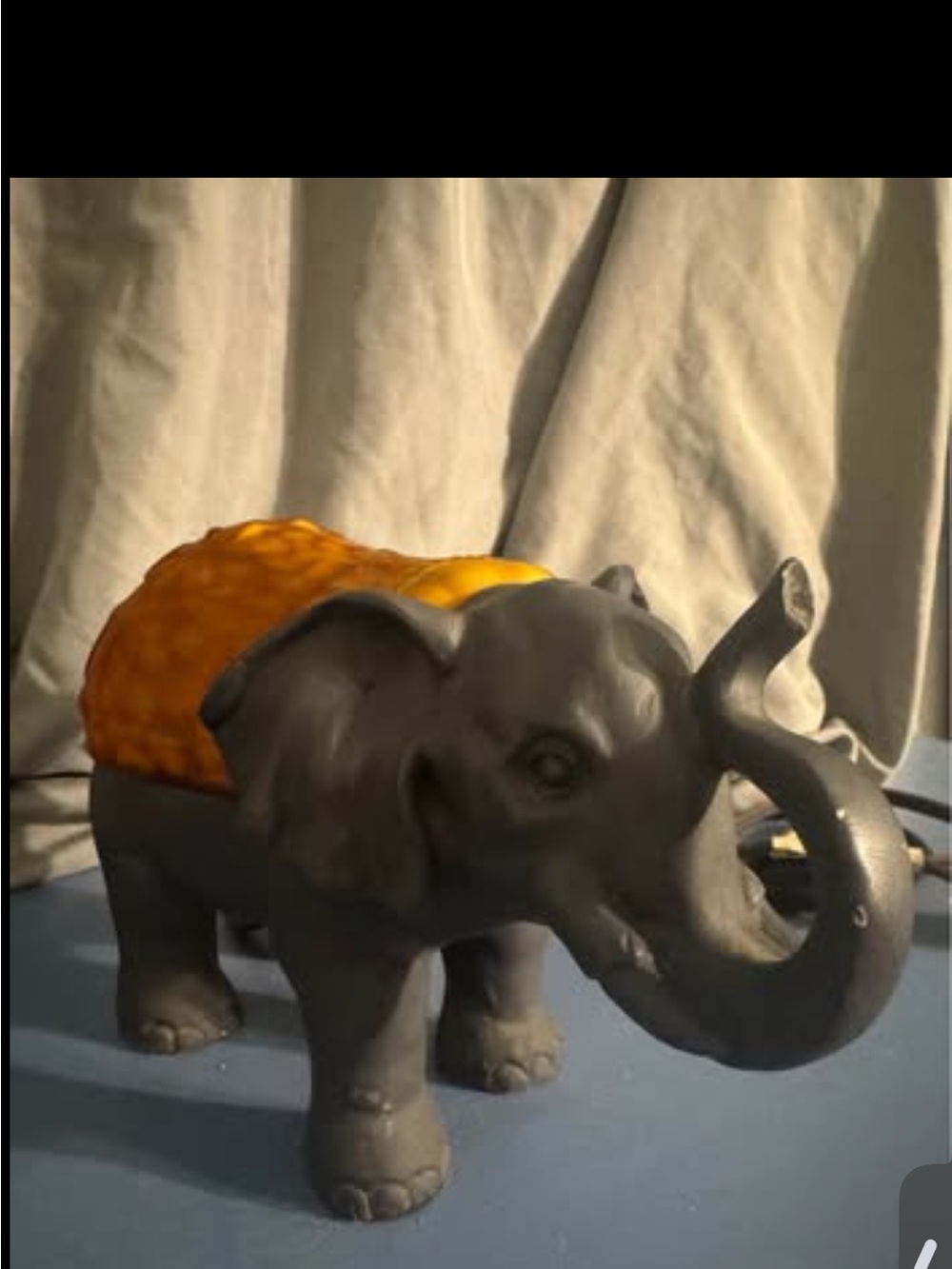 Ceramic Elephant Figurine with Amber Saddle